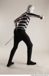 Man Adult Athletic Another Fighting with knife Standing poses Casual